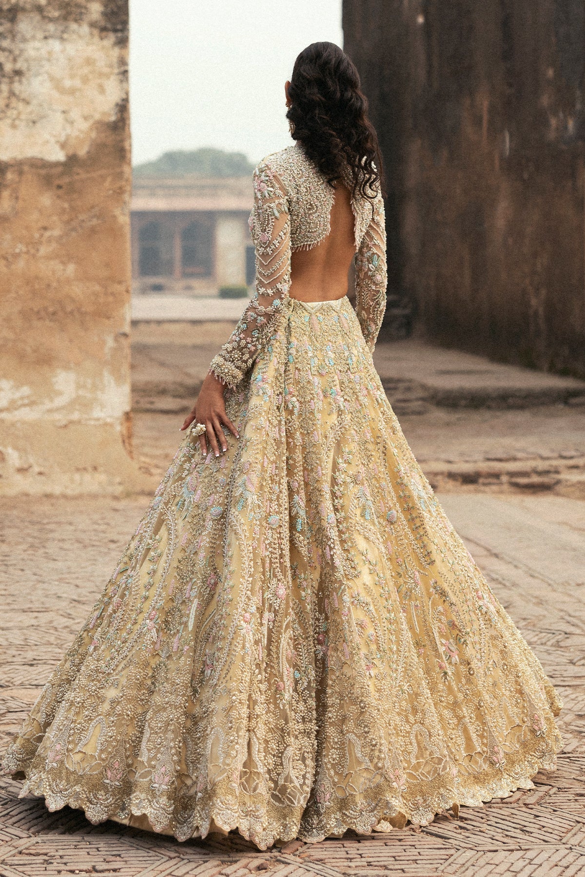 Saad Bin Shahzad Deeba – light yellow embroidered lehenga choli from Sona Gachi Bridals'24 – view 2